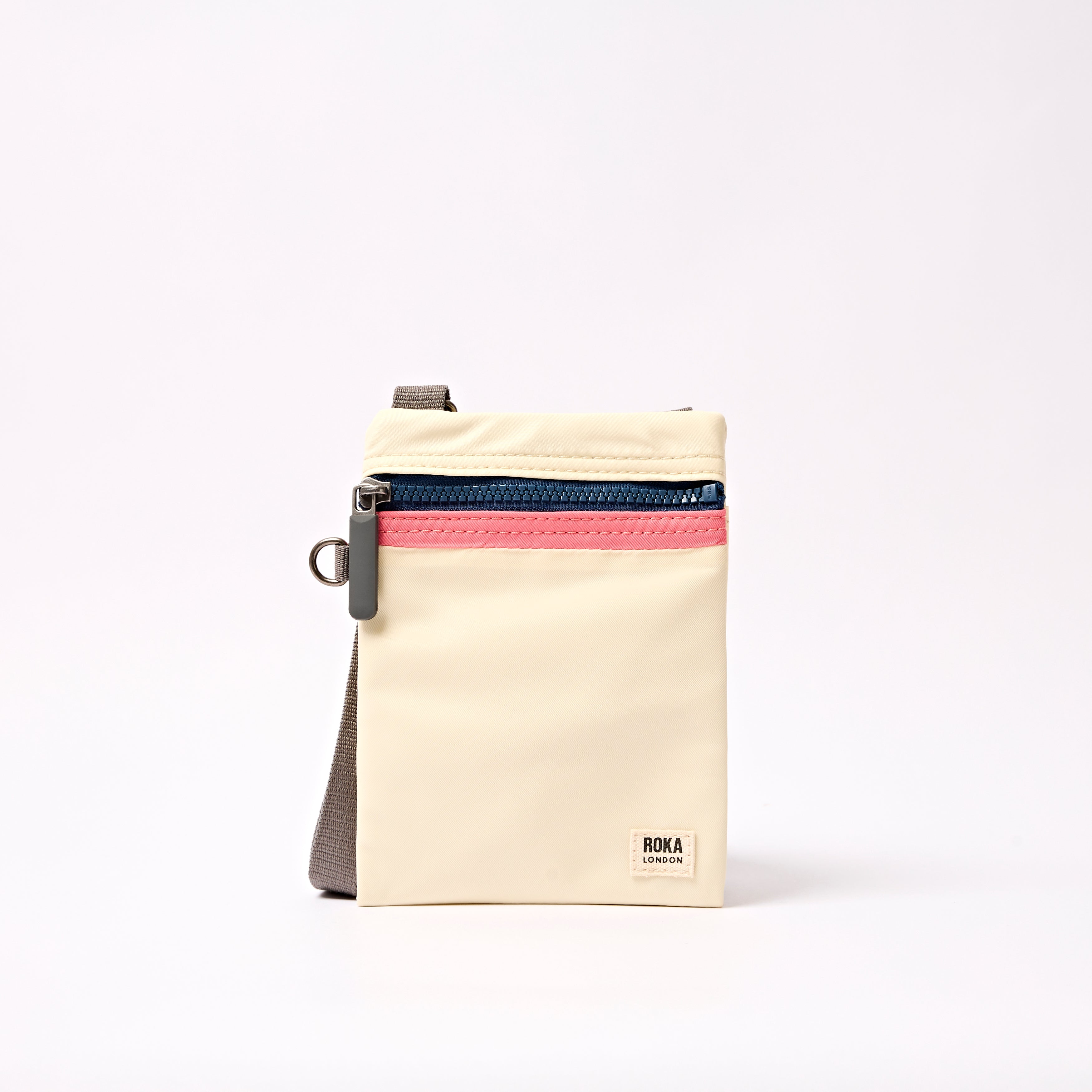 Chelsea Pocket Sling Bag in Wax Paper Stripe – ROKA London