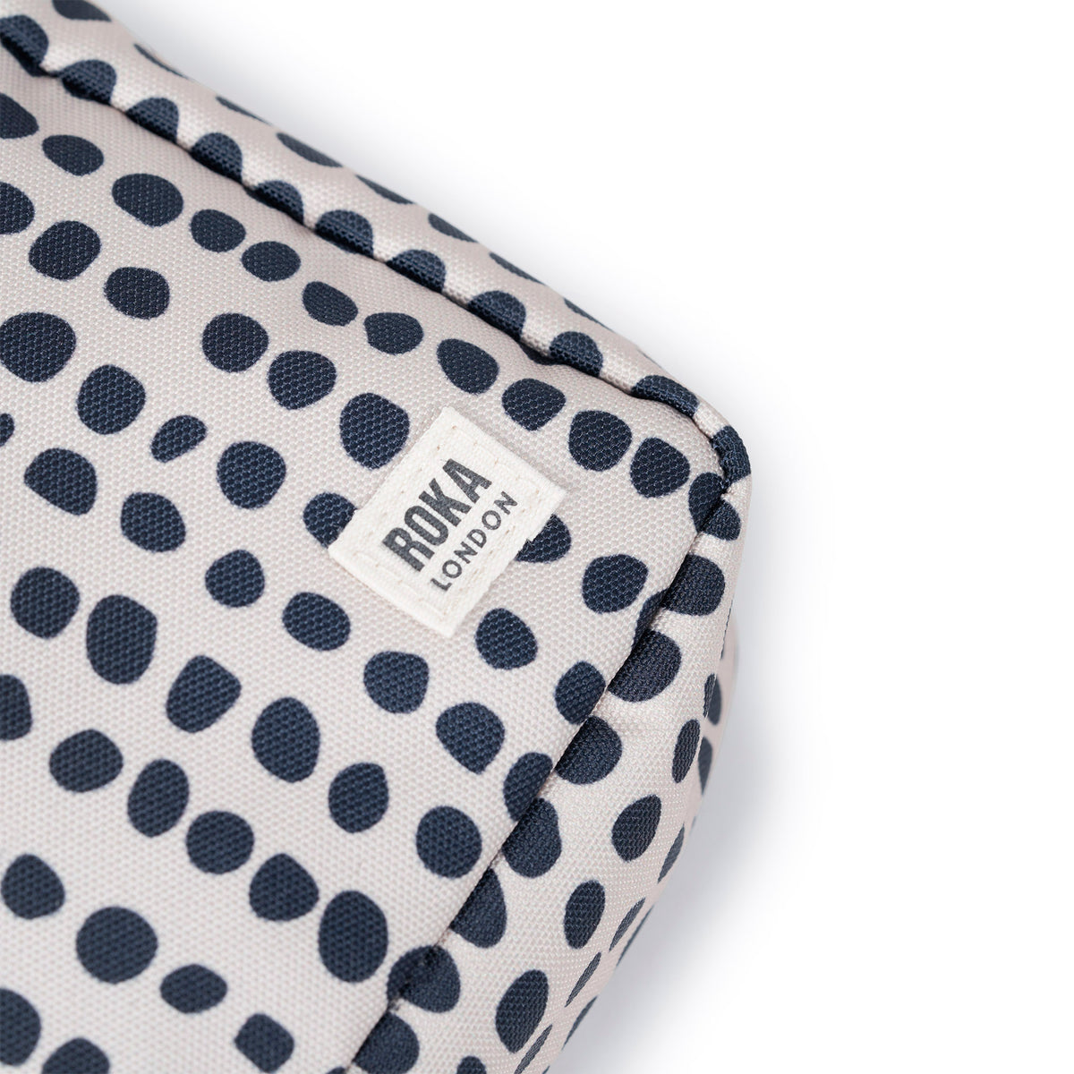 Bond Pocket Crossbody Bag in Linear Dot
