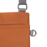 Chelsea Pocket Sling Bag in Bran