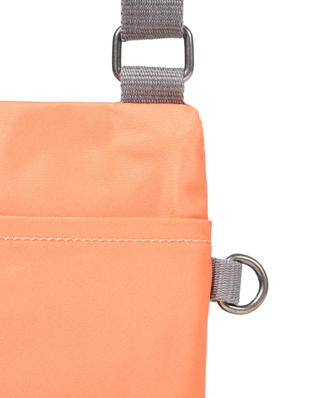Chelsea Pocket Sling Bag in Firecracker