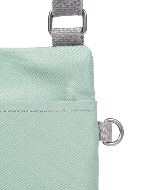 Chelsea Pocket Sling Bag in Frost