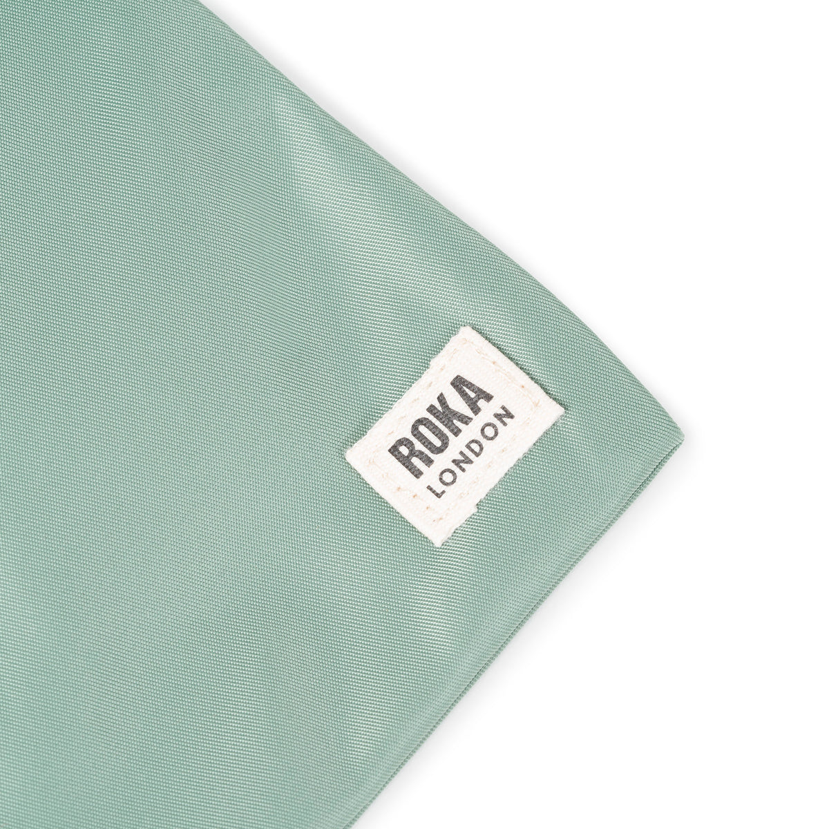 Chelsea Pocket Sling Bag in Frost