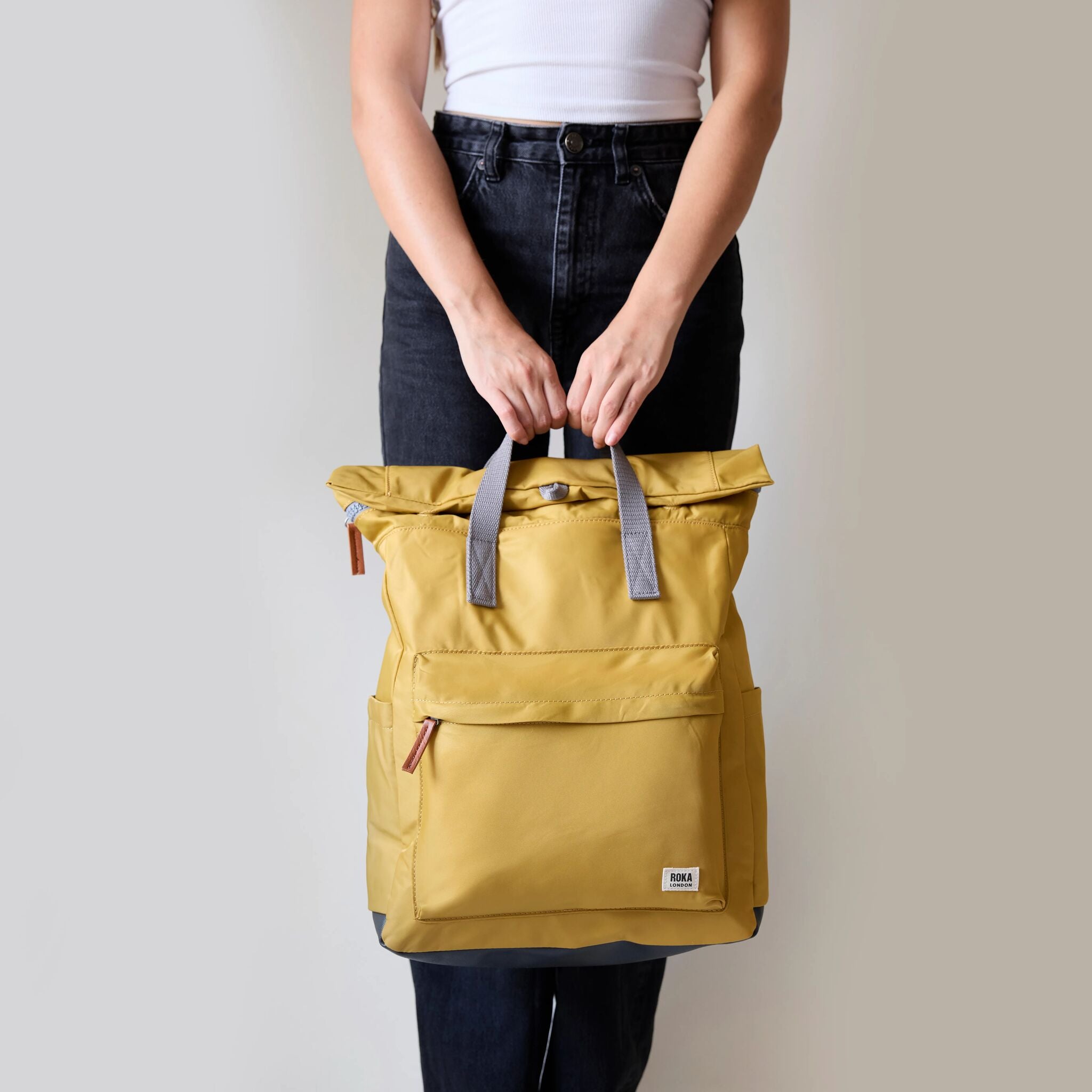 Canfield Roll Top Backpack in Burnt Blue – ROKA London