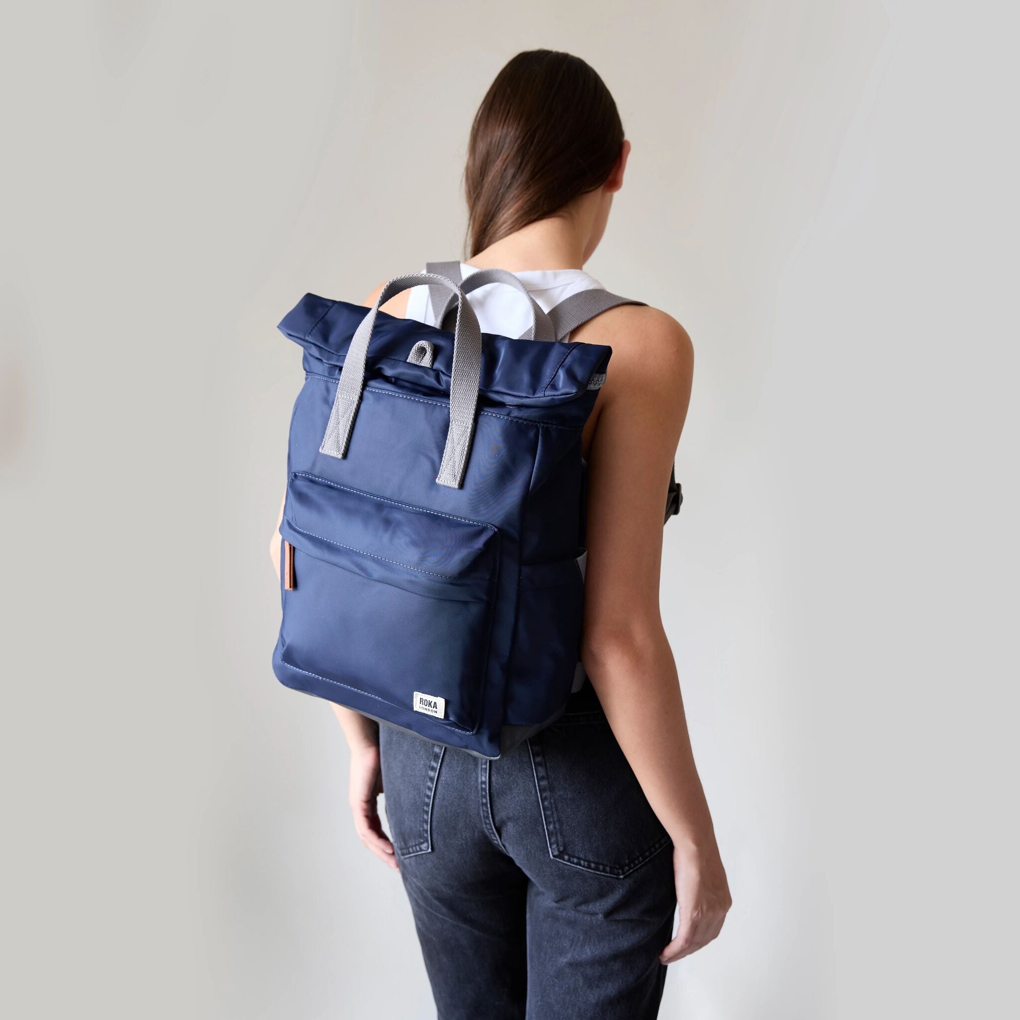 All Black Canfield Roll Top Backpack in Ash – ROKA London