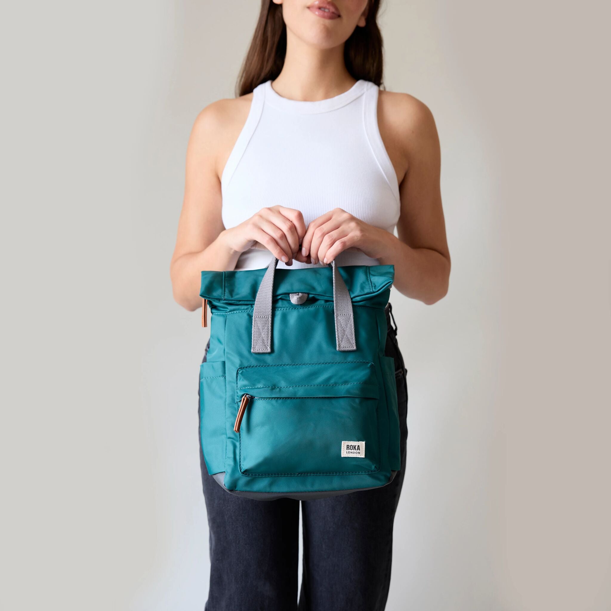 All Black Canfield Roll Top Backpack in Simple Purple – ROKA London