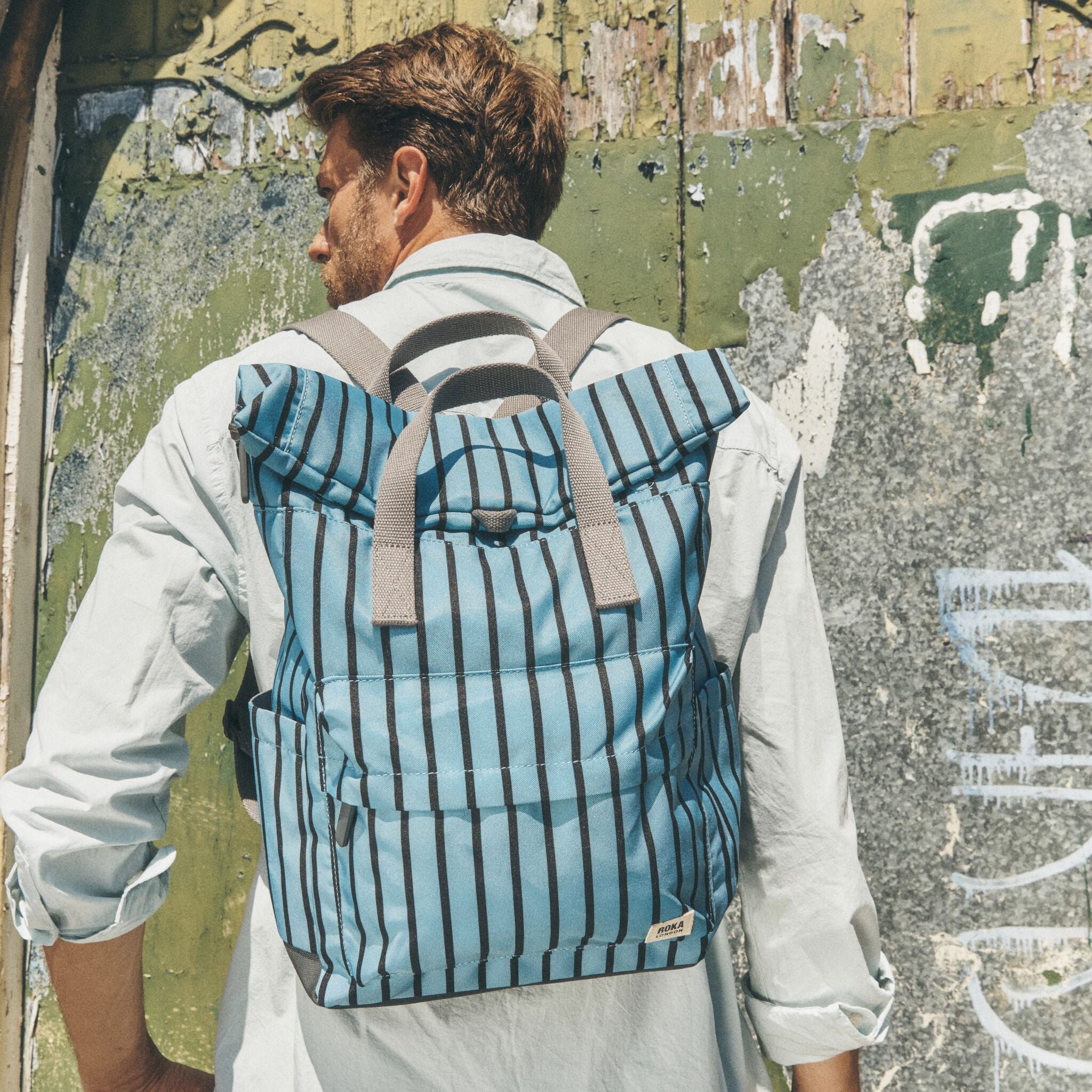 Canfield Roll Top Backpack in Blue Stripe – ROKA London