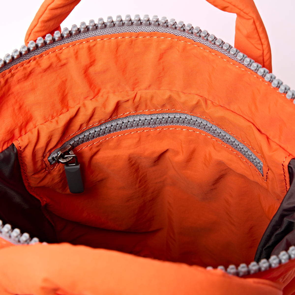 Bantry XS Backpack in Retro Tangerine Puffy