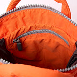 Bantry XS Backpack in Retro Tangerine Puffy