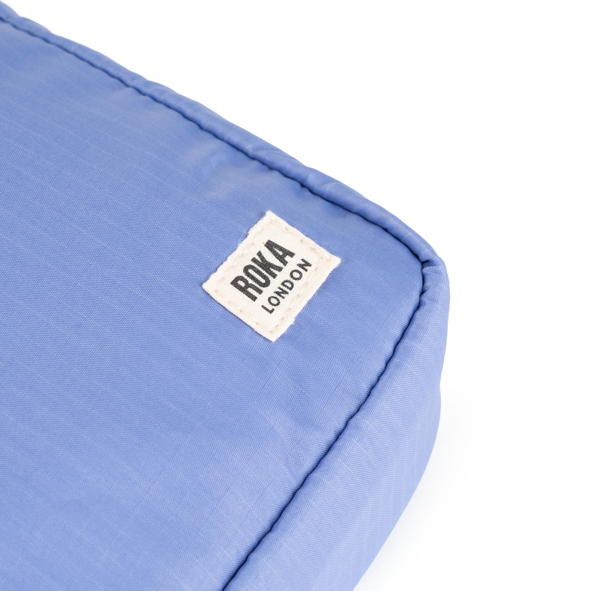 Bond Pocket Crossbody Bag in Jacaranda – ROKA London