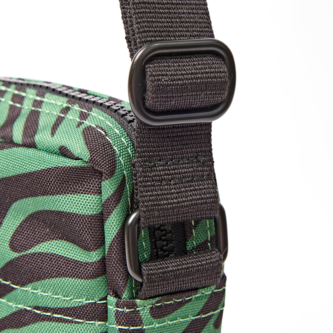 Bond Pocket Crossbody Bag in Mixed Animal Artichoke