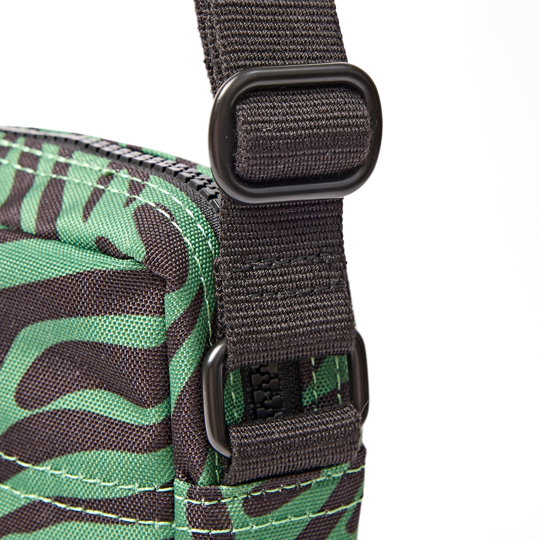 Bond Pocket Crossbody Bag in Mixed Animal Artichoke