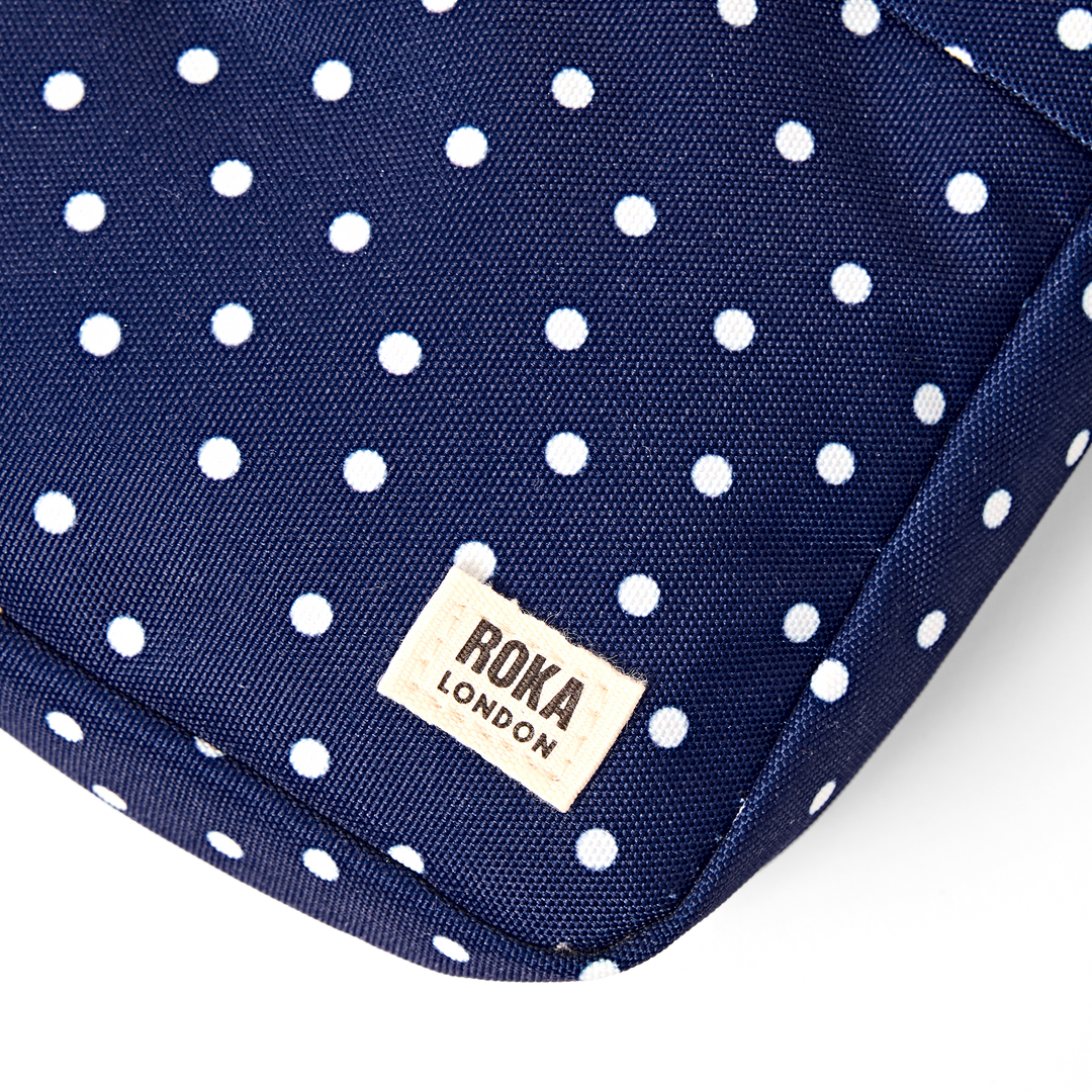 Bond Pocket Crossbody Bag in Navy Polka Dot