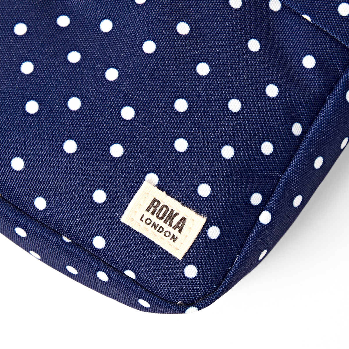 Bond Pocket Crossbody Bag in Navy Polka Dot