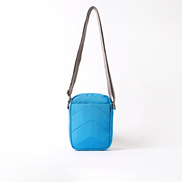 Bond Pocket Crossbody Bag in Malibu Blue Recycled Canvas