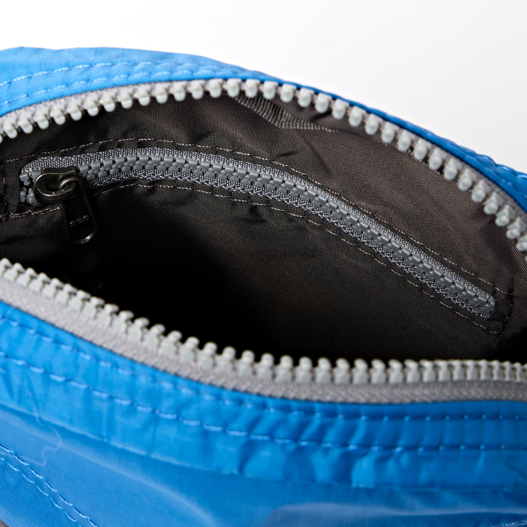 Bond Pocket Crossbody Bag in Malibu Blue Recycled Nylon Ripstop