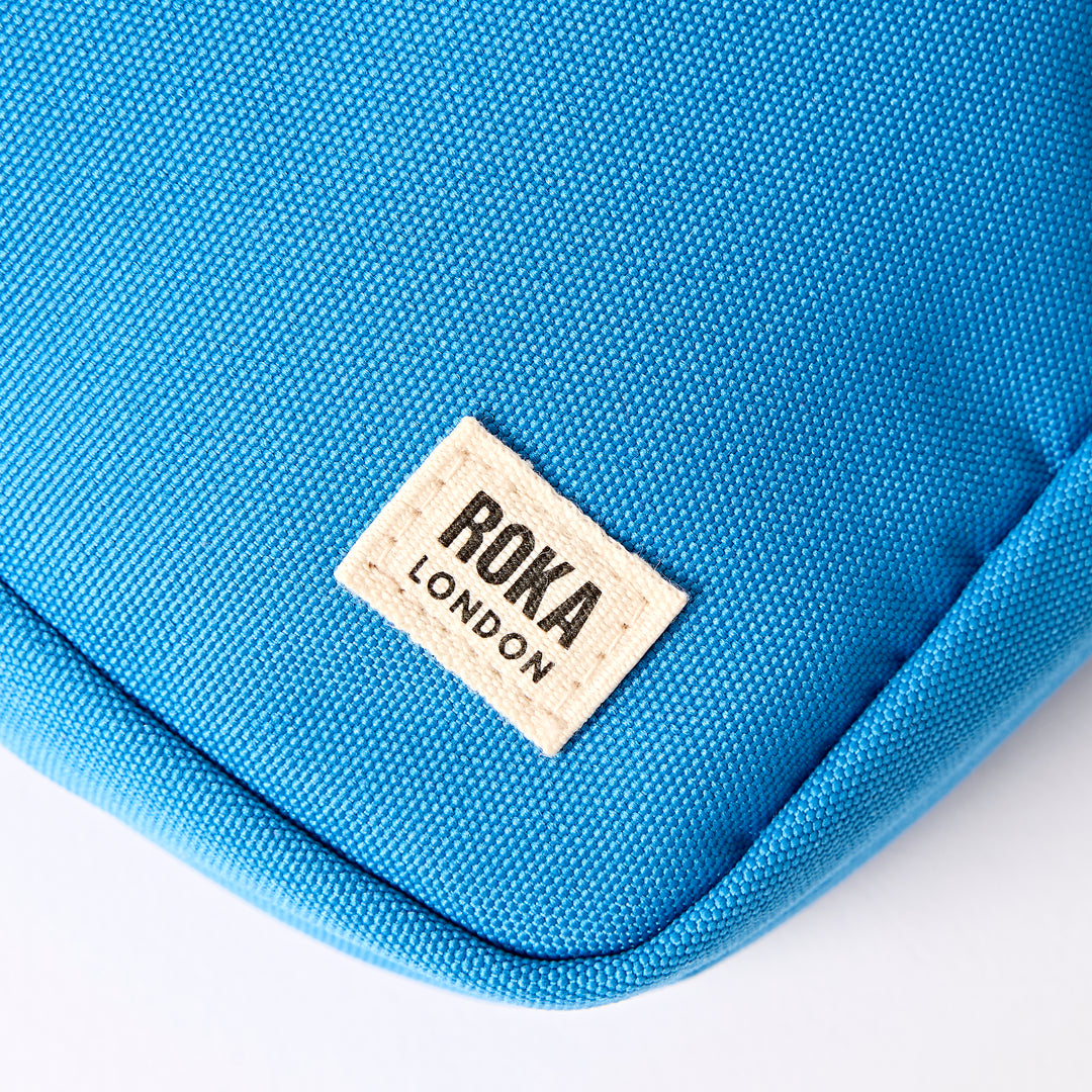 Bond Pocket Crossbody Bag in Malibu Blue Recycled Canvas