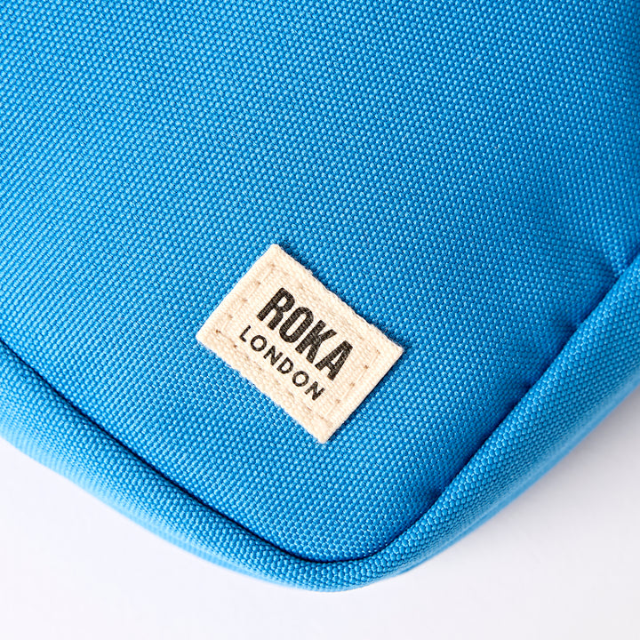 Bond Pocket Crossbody Bag in Malibu Blue Recycled Canvas