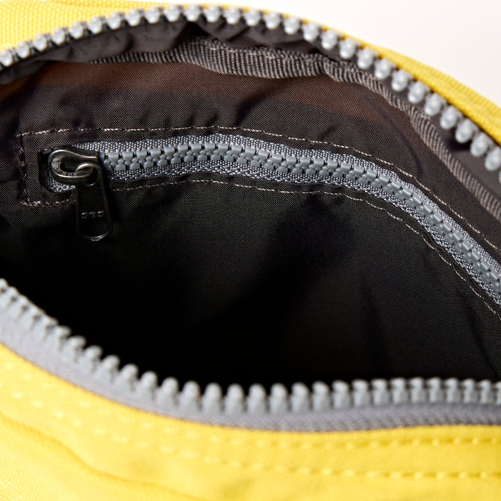 Bond Pocket Crossbody Bag in Passion Fruit Recycled Canvas