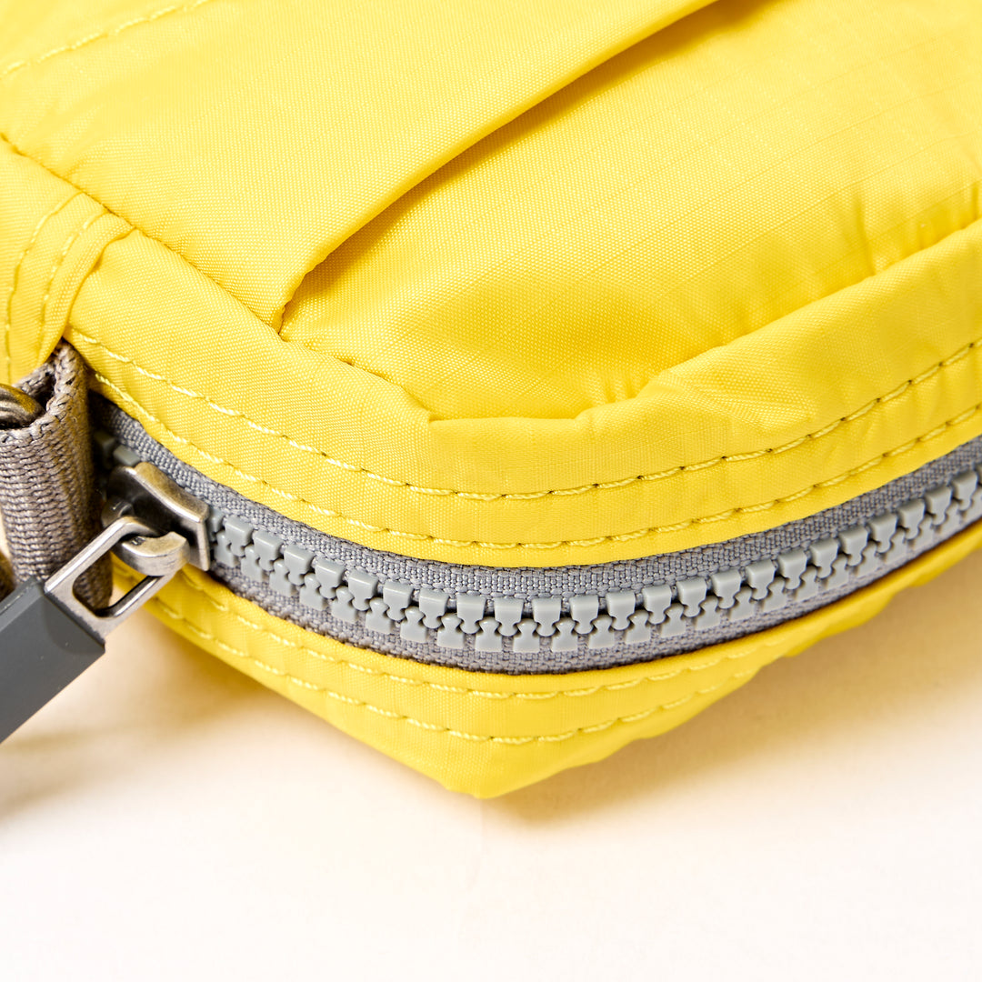 Bond Pocket Crossbody Bag in Passion Fruit Recycled Nylon Ripstop