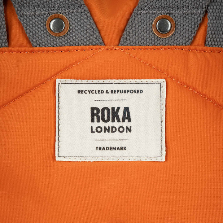 Canfield Roll Top Backpack in Burnt Orange