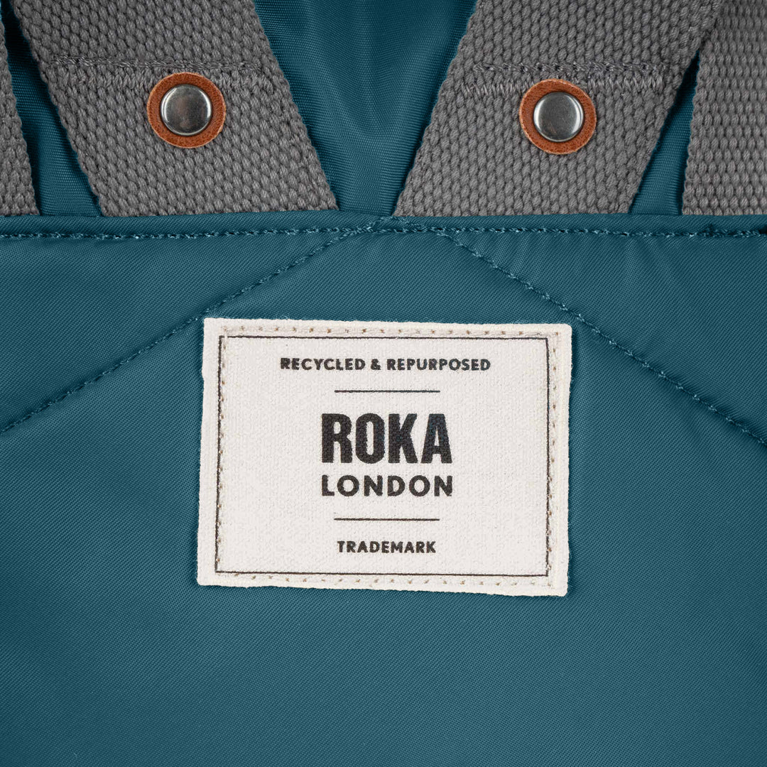 Canfield Roll Top Backpack in Teal
