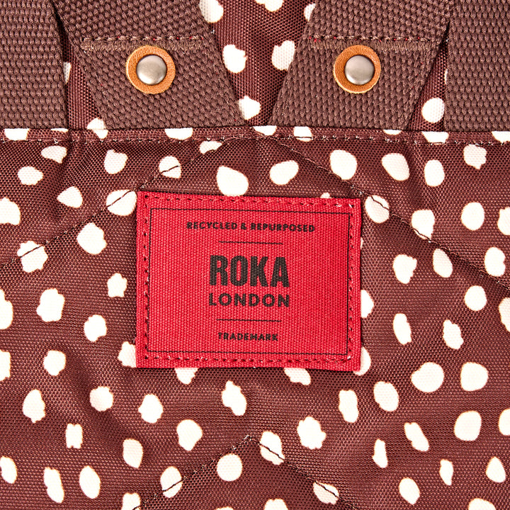 Canfield Roll Top Backpack in Brown Dot