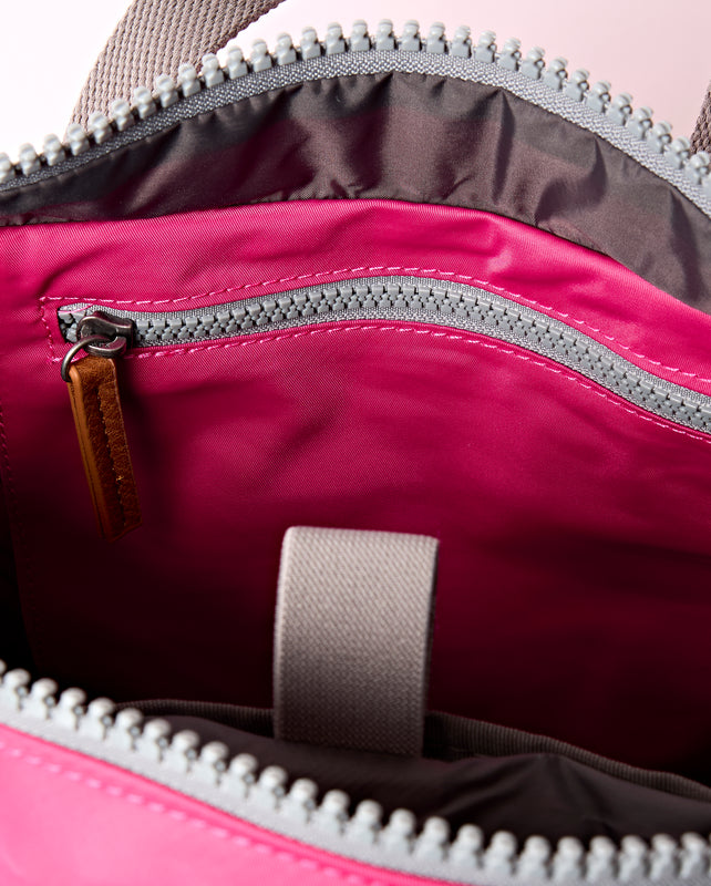 Canfield Roll Top Backpack in Granita Red