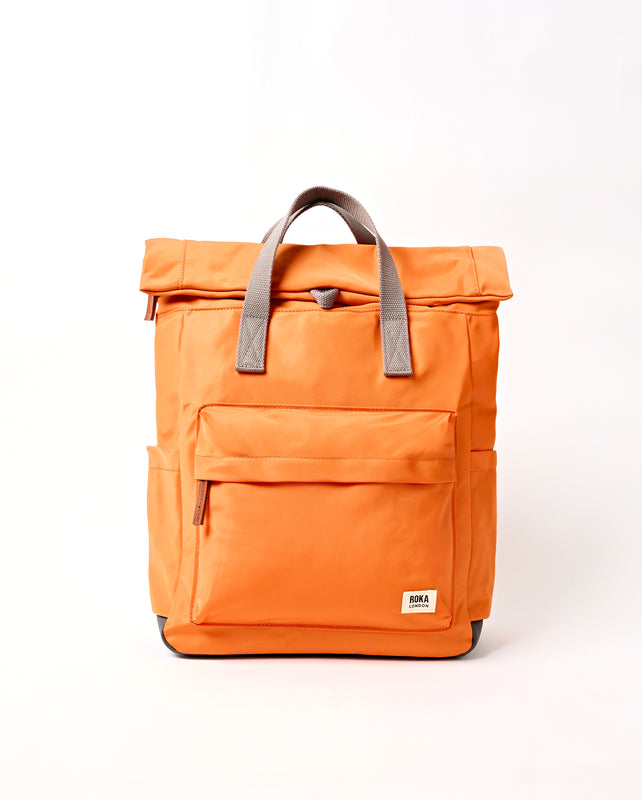 Canfield Roll Top Backpack in Jaffa Orange