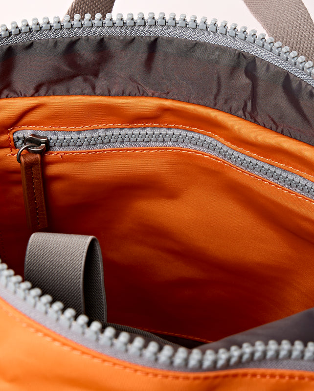 Canfield Roll Top Backpack in Jaffa Orange