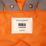 Canfield Roll Top Backpack in Jaffa Orange