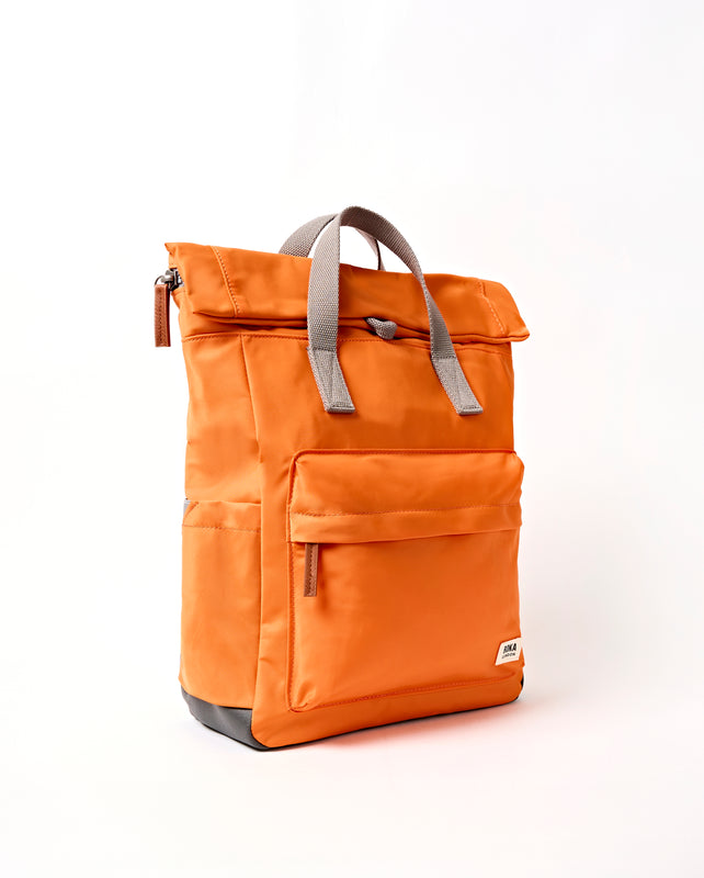 Canfield Roll Top Backpack in Jaffa Orange