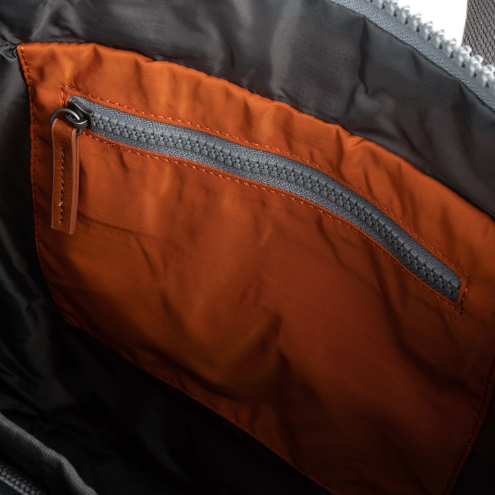 Canfield Roll Top Backpack in Burnt Orange