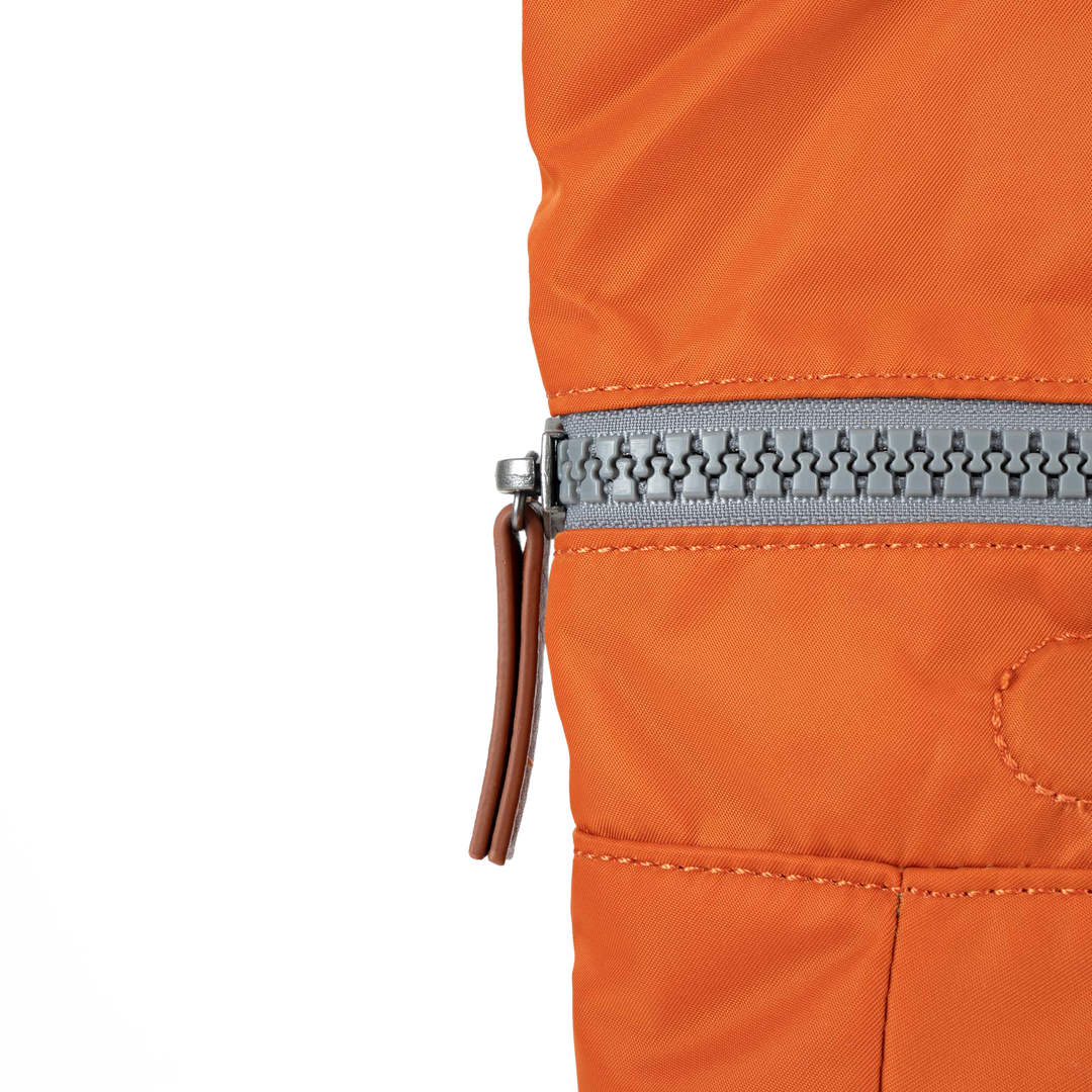 Canfield Roll Top Backpack in Burnt Orange