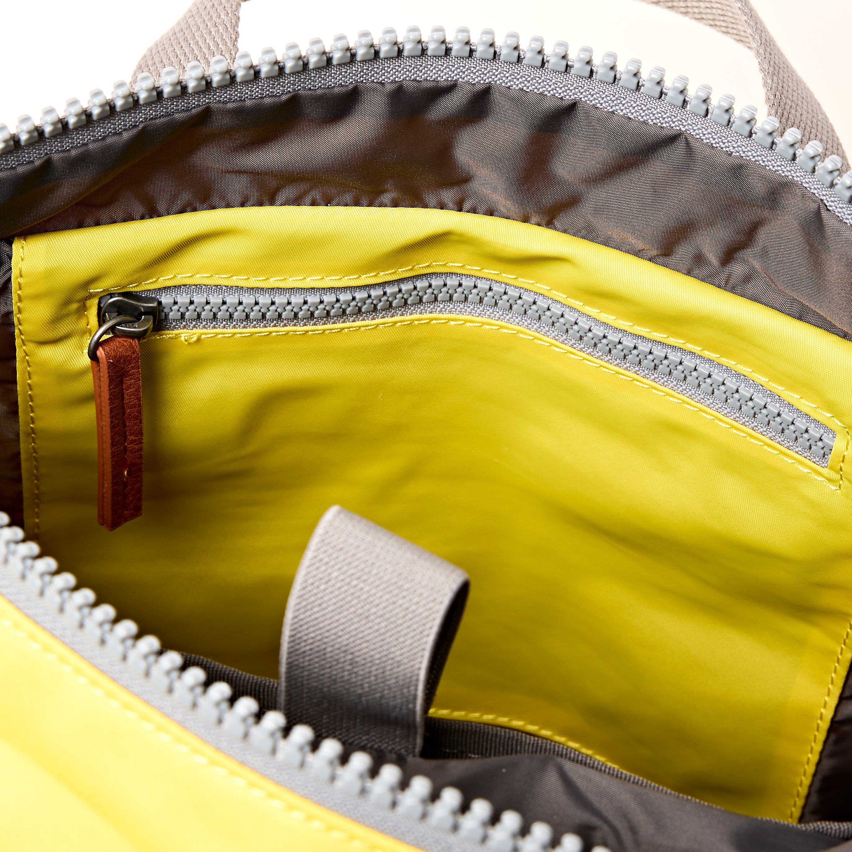 Canfield Roll Top Backpack in Passion Fruit – ROKA London