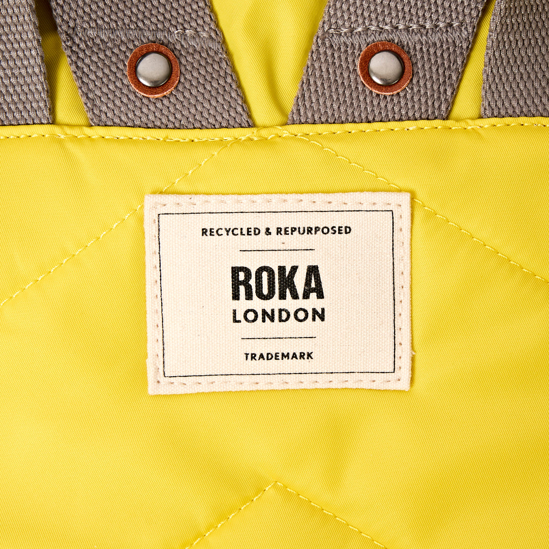 Canfield Roll Top Backpack in Passion Fruit