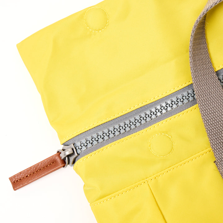 Canfield Roll Top Backpack in Passion Fruit