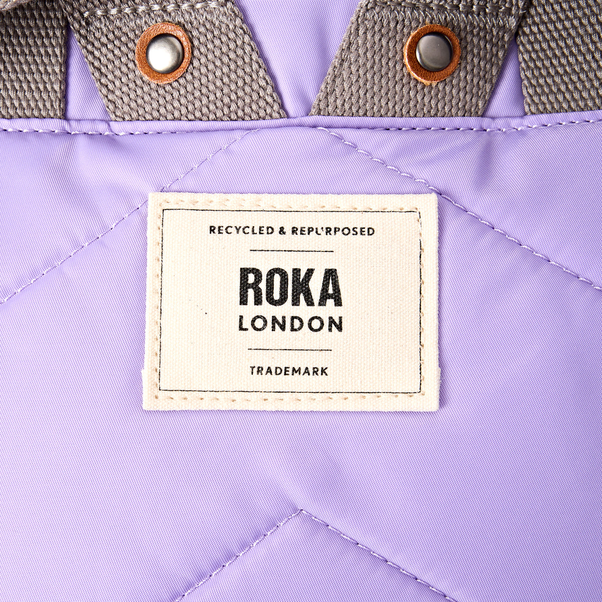 Canfield Roll Top Backpack in Thistle Bloom