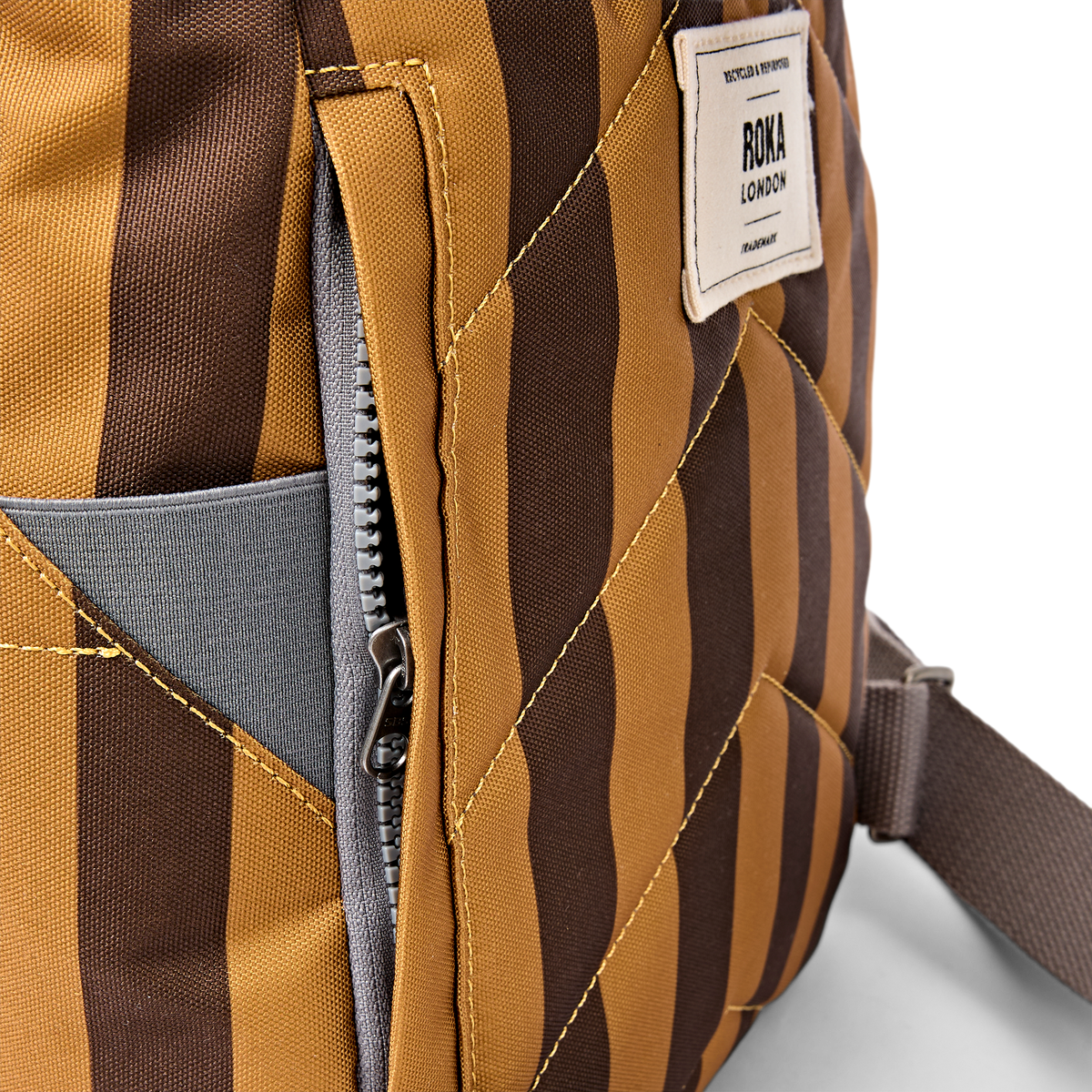 Canfield Roll Top Backpack in Brown Stripe