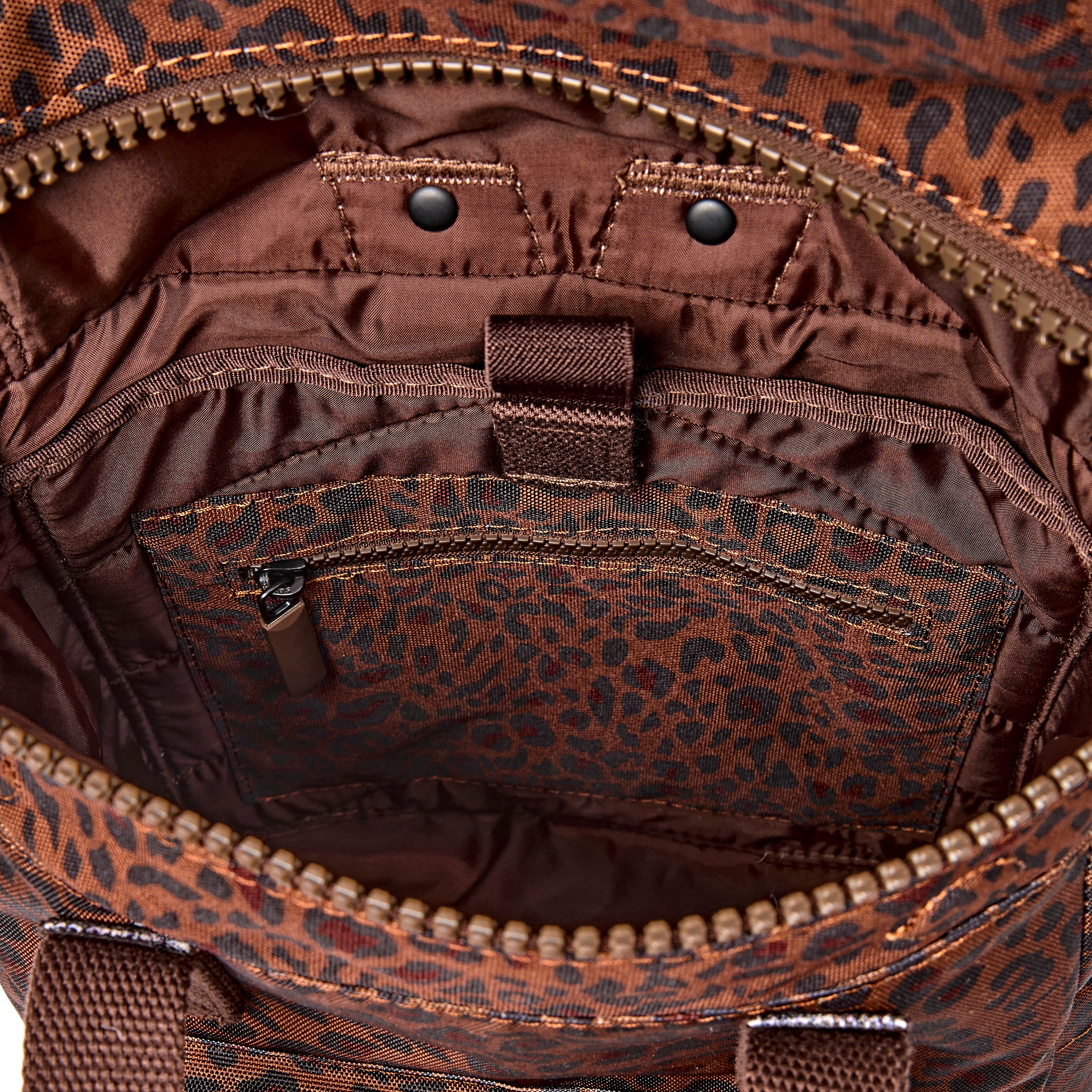 Canfield Roll Top Backpack in Mini Leopard – ROKA London