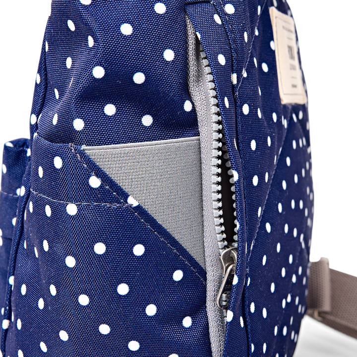 Canfield Roll Top Backpack in Navy Polka Dot