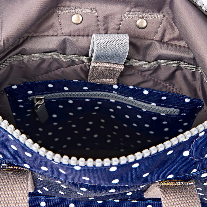 Canfield Roll Top Backpack in Navy Polka Dot