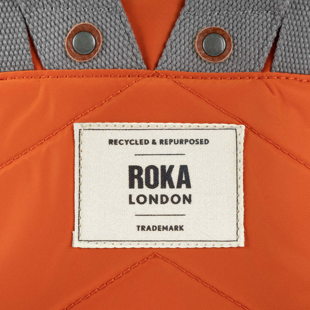 Canfield Roll Top Backpack in Burnt Orange
