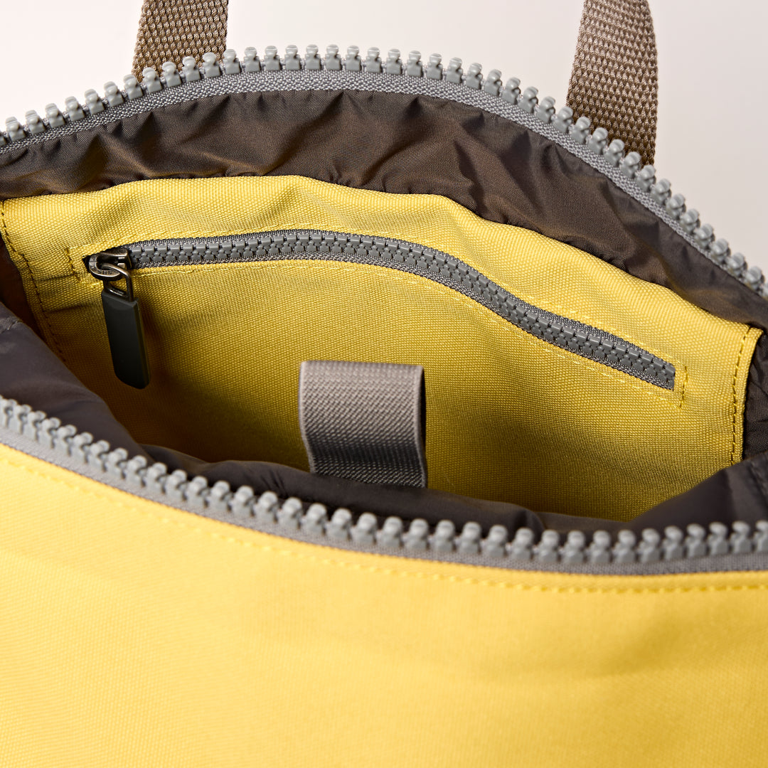 Canfield Roll Top Backpack in Lemonade Stripe