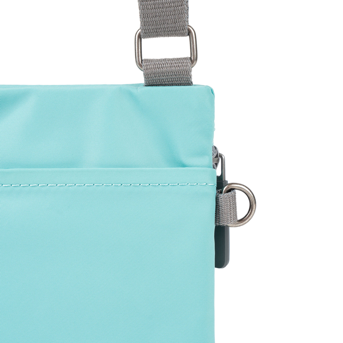 Chelsea Pocket Sling Bag in Aquatic Awe