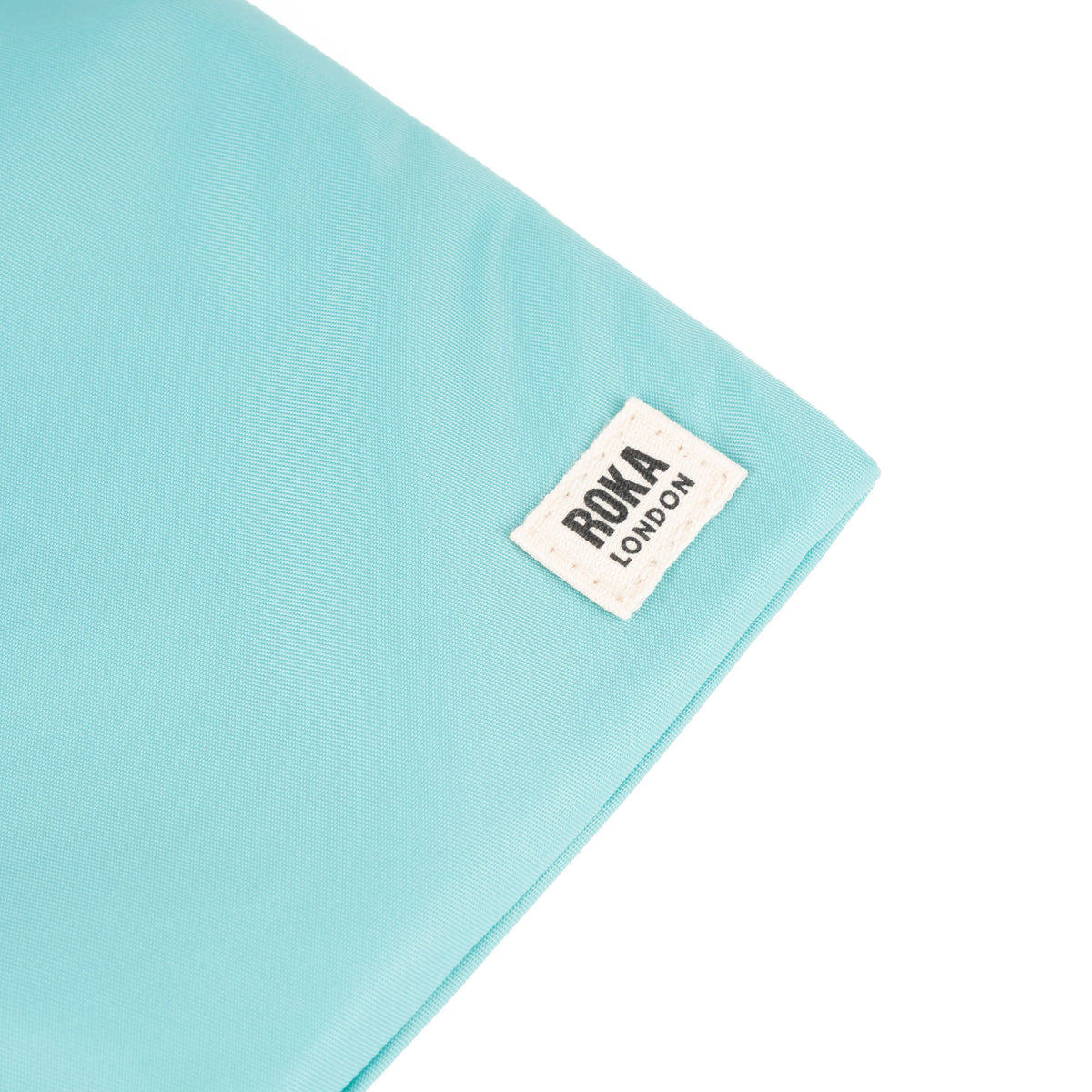 Chelsea Pocket Sling Bag in Aquatic Awe