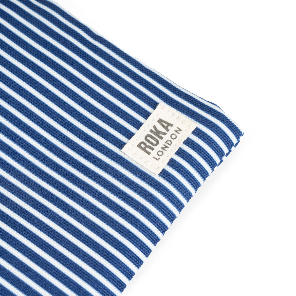 Chelsea Pocket Sling Bag in Blue Hickory