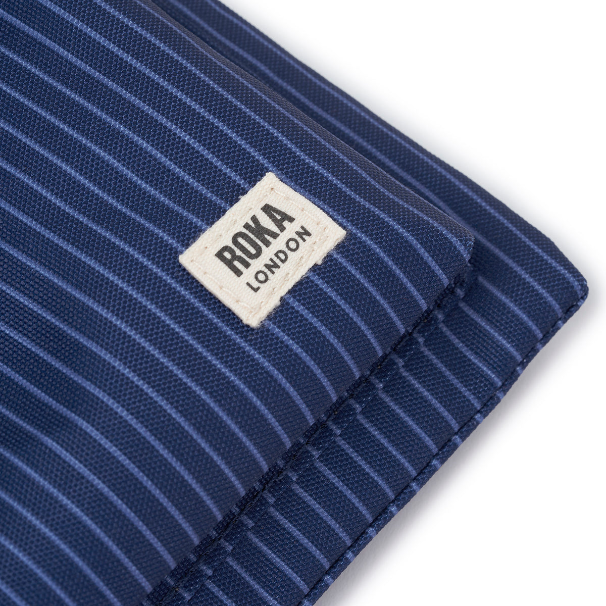 Chelsea B Crossbody Bag in Dark Denim Pin Stripe