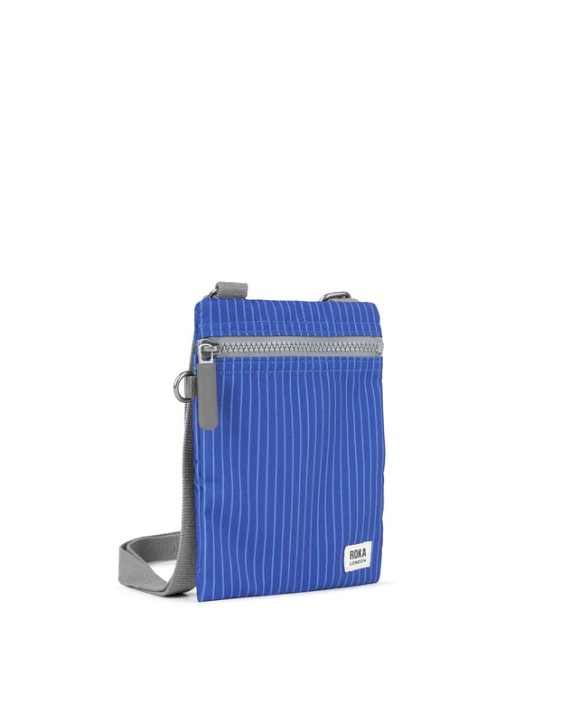 Chelsea Pocket Sling Bag in Light Wash Denim
