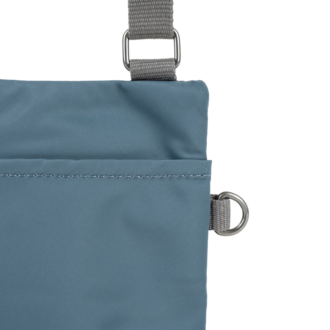 Chelsea Pocket Sling Bag in Airforce