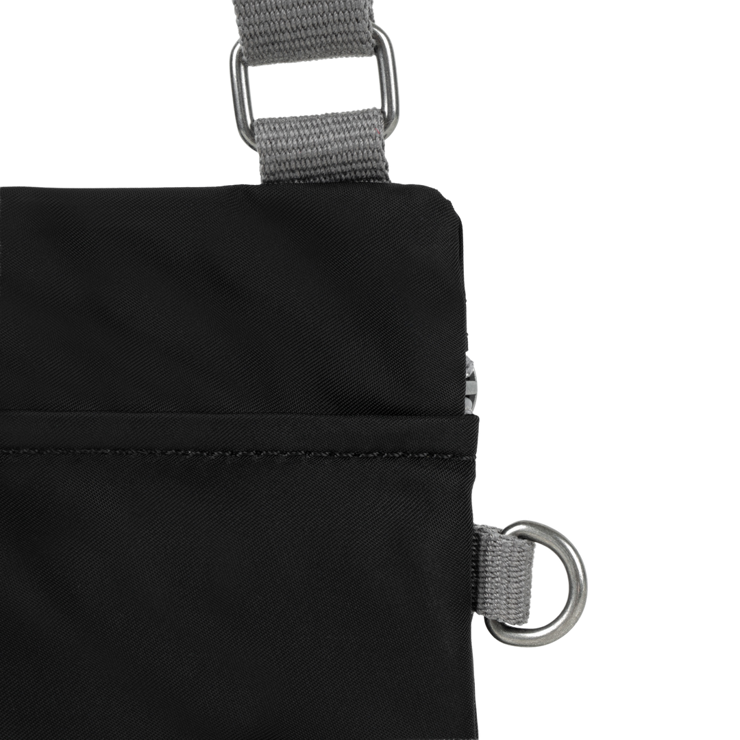 Chelsea Pocket Sling Bag in Black